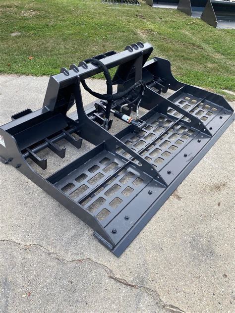 cat skid steer land leveler|driveway leveler for skid steer.